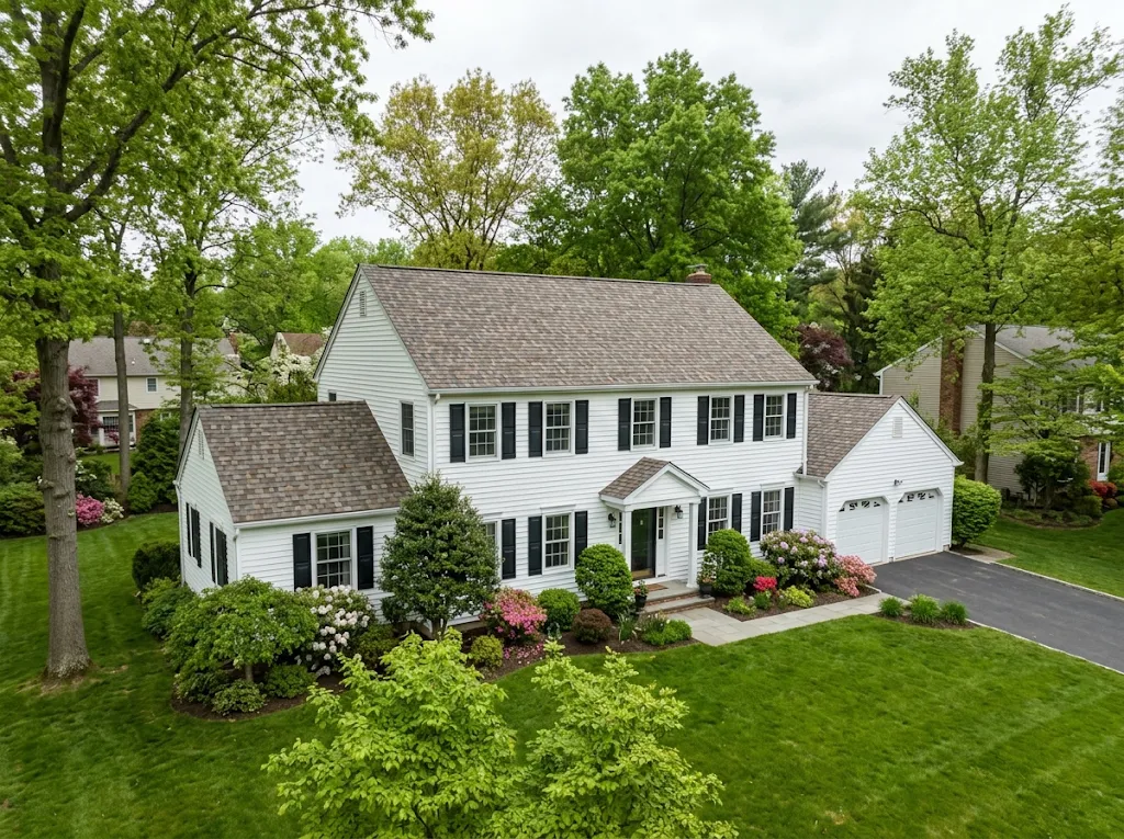 Center-hall Colonial with a new shingle roof